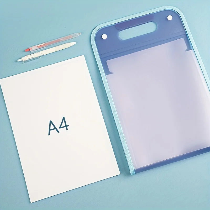 Flat lay of A4 paper, red and white pens, and translucent blue document folder with handle; designed for organizing school or office materials, showcasing compatibility with A4-sized documents.