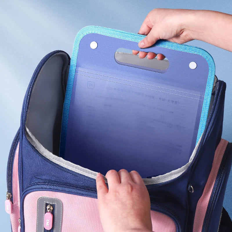 Blue and purple A4 document folder with handle being placed into a pink and blue backpack; designed for secure, portable organization of papers, ideal for students and professionals on the go.