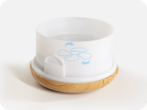 ASAKUKI diffuser with swirling airflow design and wood base—stylish aromatherapy device for clean indoor air and modern home decor