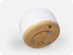 ASAKUKI diffuser bottom view—wood base with air intake and clean design for safe, efficient aromatherapy performance
