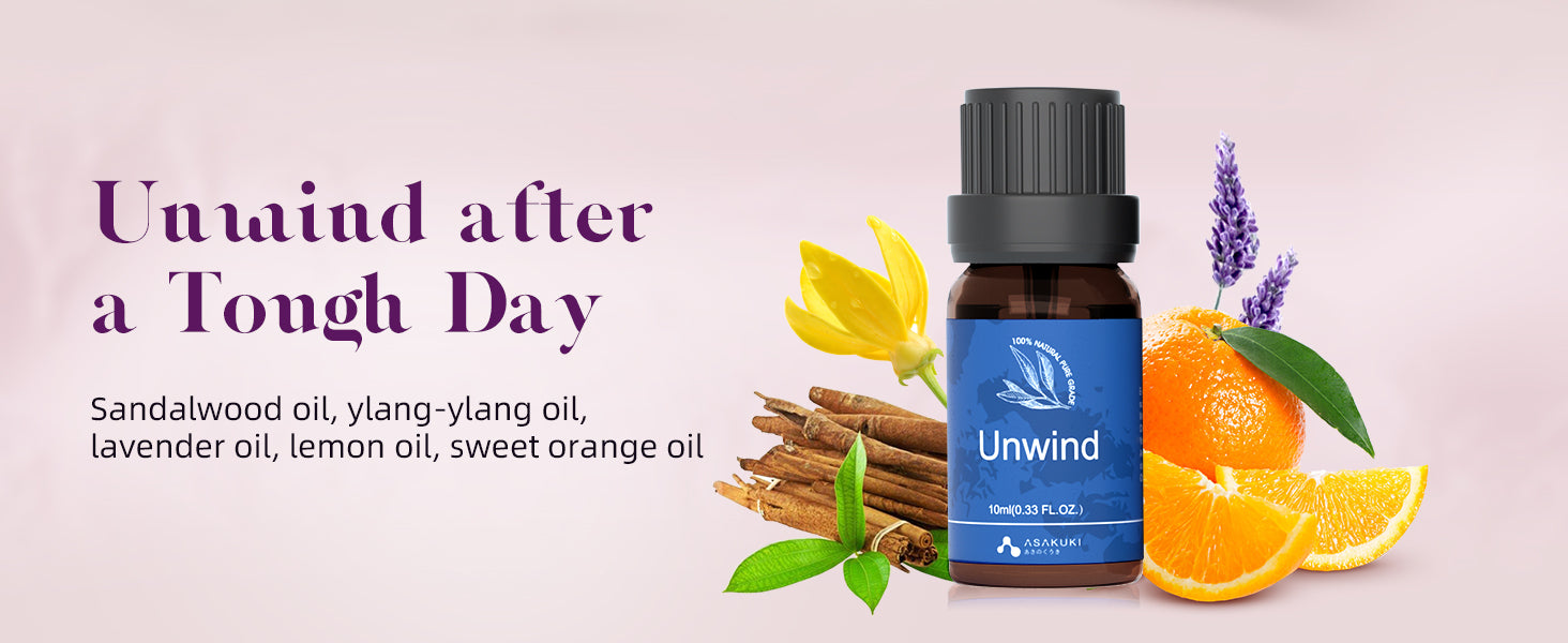 ASAKUKI Unwind essential oil blend—amber bottle with sandalwood, ylang-ylang, lavender, lemon, and sweet orange for stress relief and end-of-day relaxation
