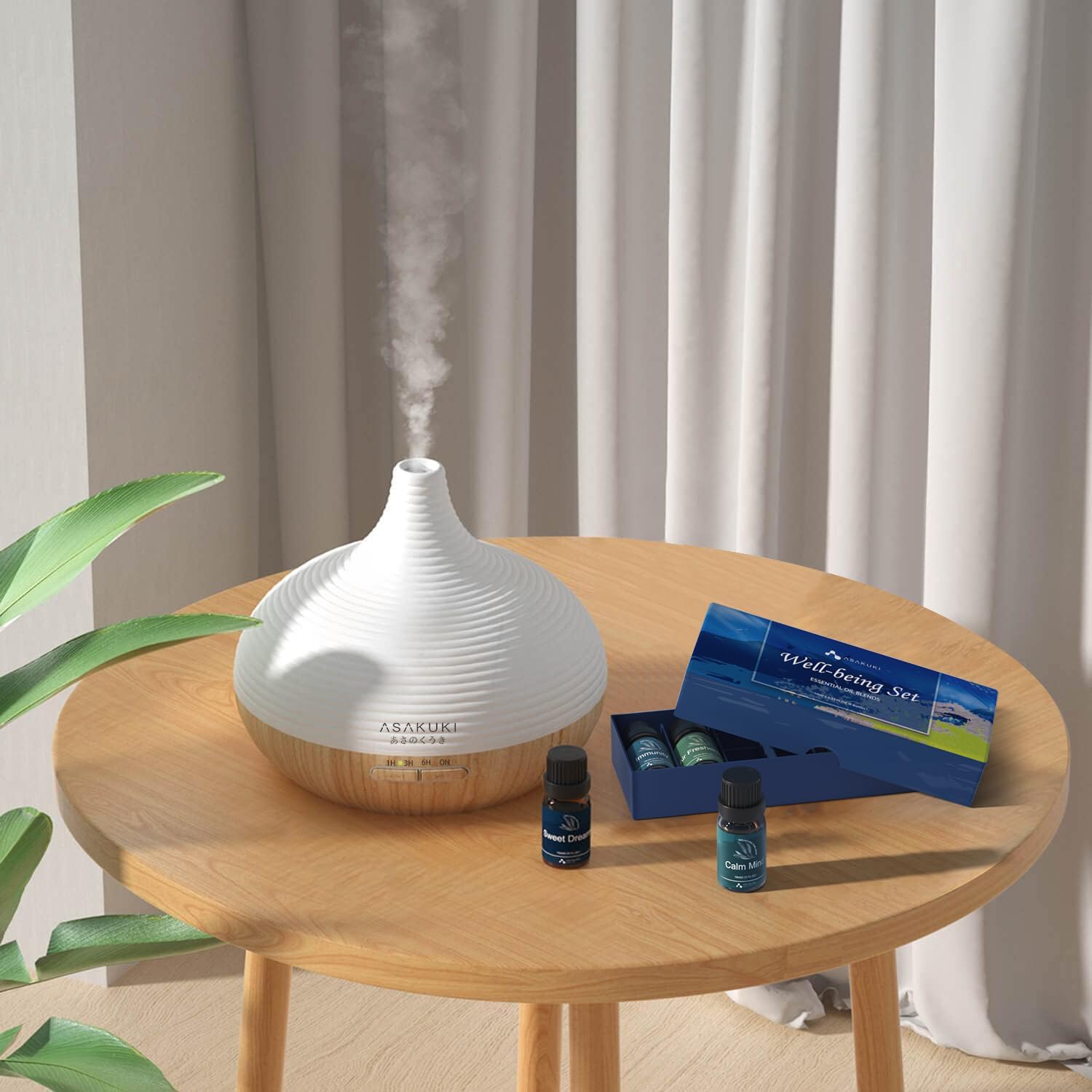 ASAKUKI Uplifting Set with teardrop diffuser and essential oils—displayed on wooden table for home aromatherapy and relaxation