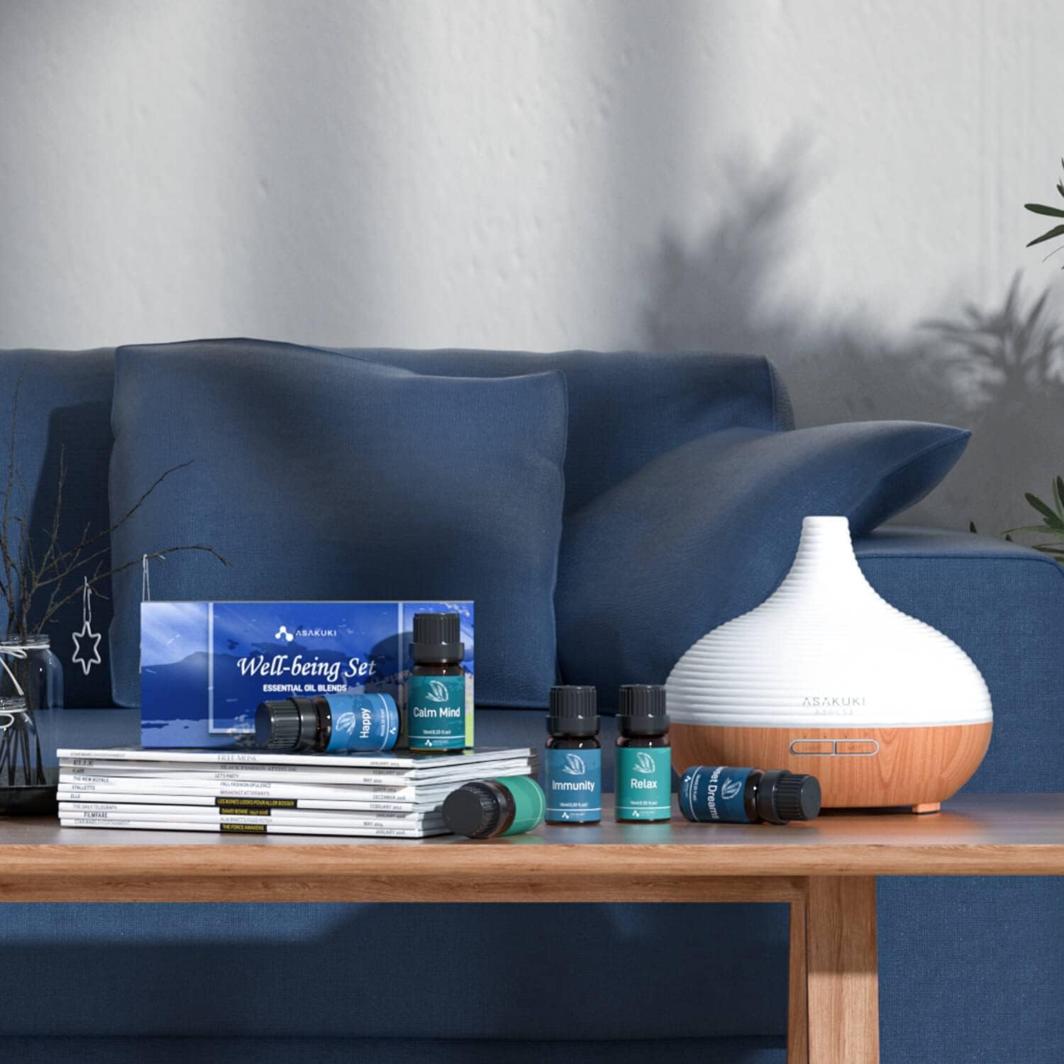 ASAKUKI Well-being Set with diffuser and essential oils—Calm Mind, Immunity, Breathe—displayed in cozy living room for daily wellness rituals