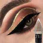 Close-up of bold black winged eyeliner with shimmering gold crease accent and ELO makeup product