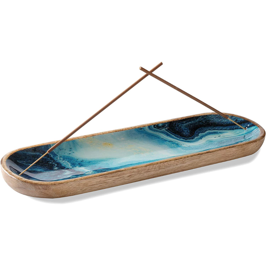 Blue marble incense holder with wood frame—two burning sticks crossed diagonally for calming aromatherapy and modern home decor