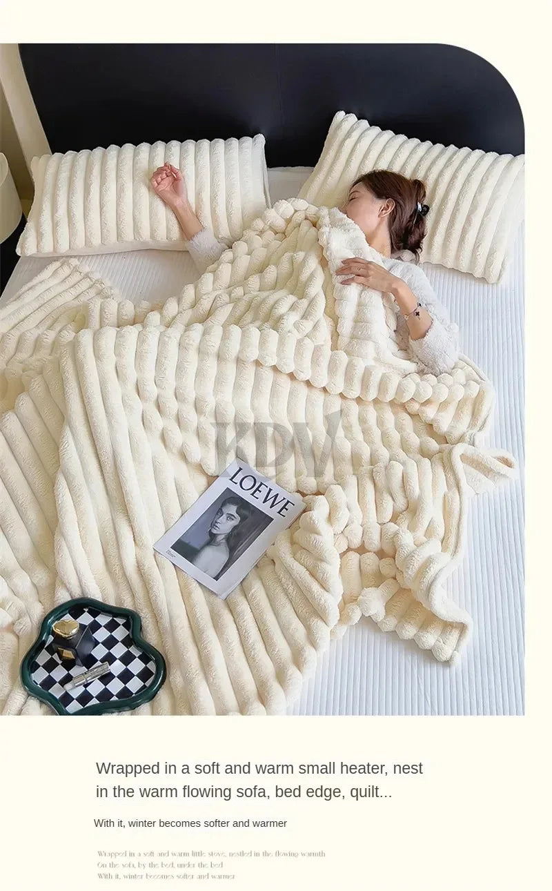 Cream-colored ribbed plush quilt and pillows on a cozy bed—featuring a person resting, LOEWE magazine, and checkered tray with cup for warm winter comfort
