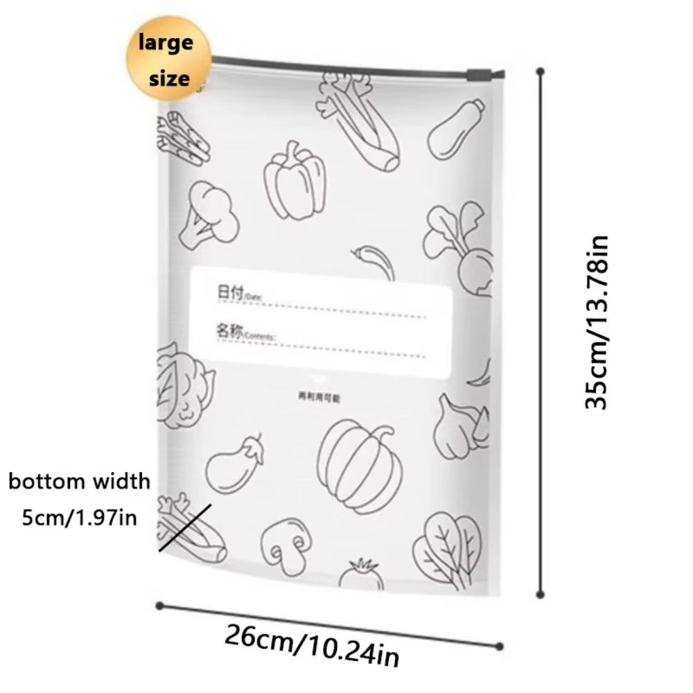 Large transparent ziplock food storage bag with vegetable illustrations and labeled date and contents fields, shown with dimensions in centimeters and inches, ideal for eco-friendly freezer organization.