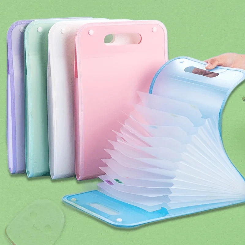 Set of five pastel-colored expanding A4 file folders with handle cutouts and snap button closures; one folder shown open with labeled compartments, demonstrating multi-pocket design for efficient document organization.