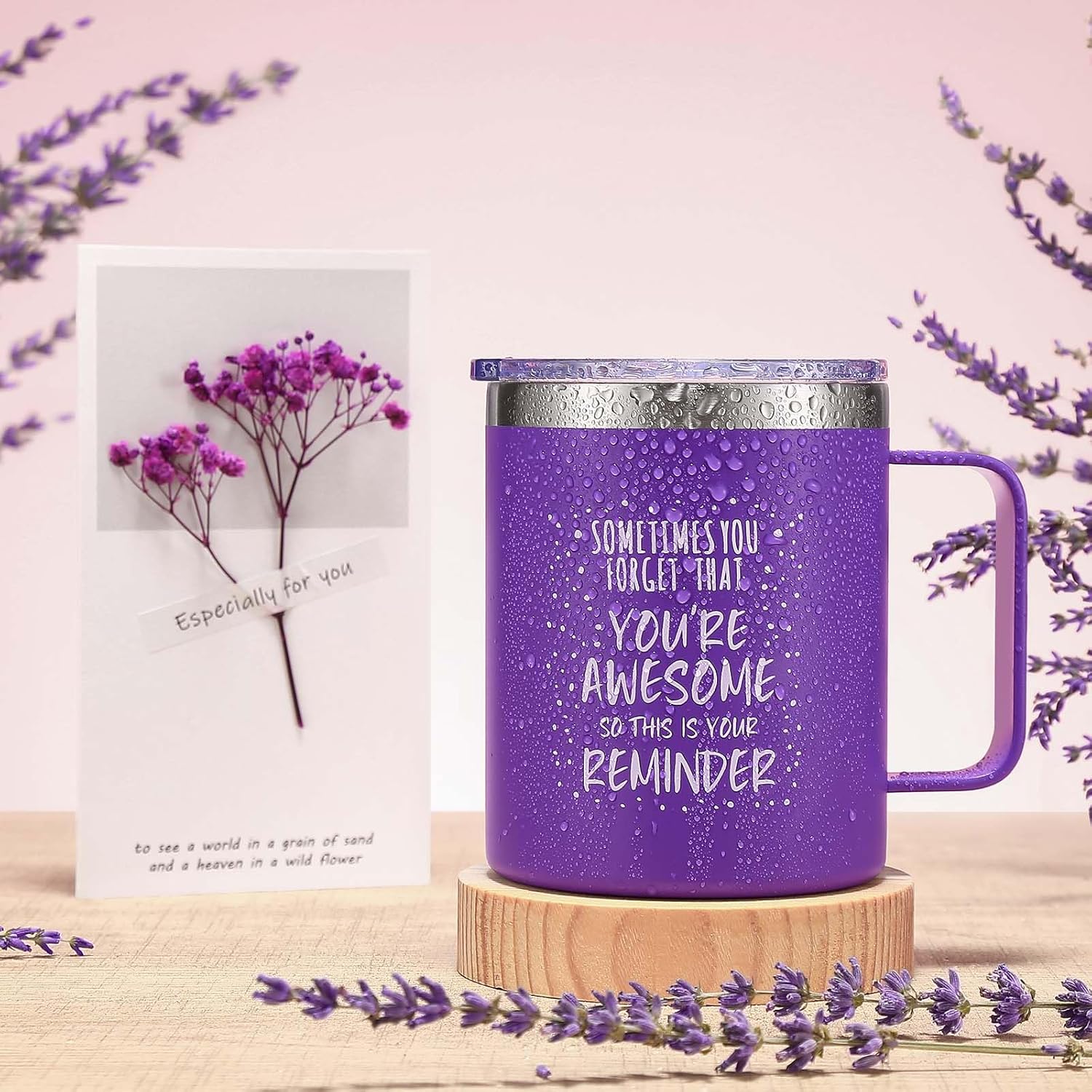 Purple glitter mug with motivational quote and greeting card—surrounded by lavender sprigs on wooden coaster with soft pink background, perfect for encouragement and self-care gifting