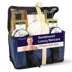 Sandalwood 7-piece men’s skincare gift set in reusable toiletry bag with body wash, lotion, sponge, and grooming essentials.