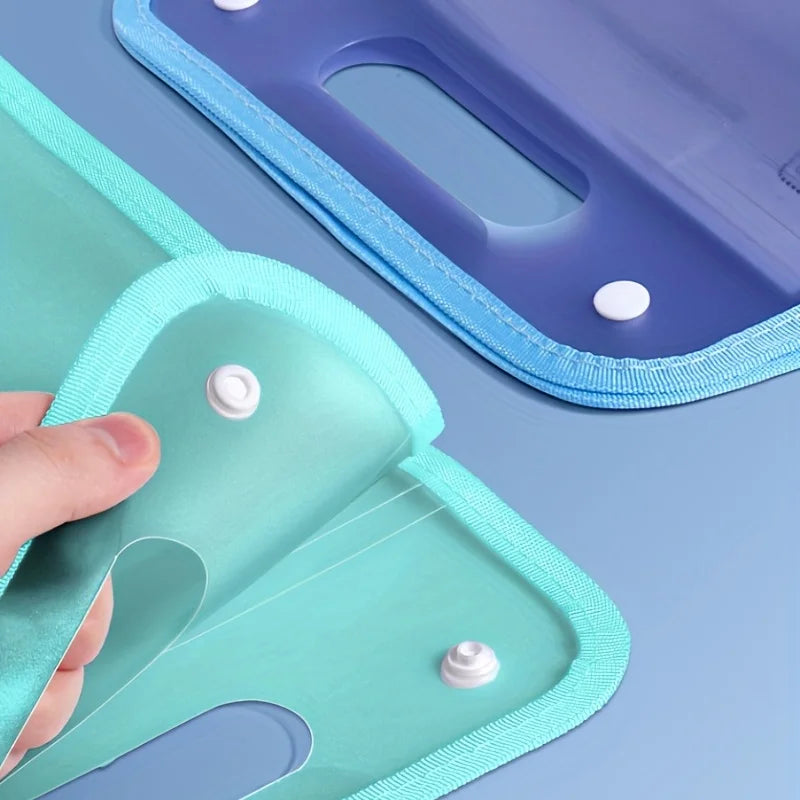 Turquoise and purple A4 document folders with white snap button closures and reinforced edges; one folder shown open to reveal transparent handle cutout, highlighting secure and portable design for organizing papers.
