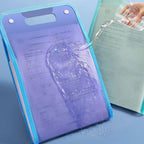 Blue waterproof document folder with transparent front cover and handle cutout; water being poured on surface to demonstrate liquid resistance, ideal for protecting papers during travel or outdoor use.