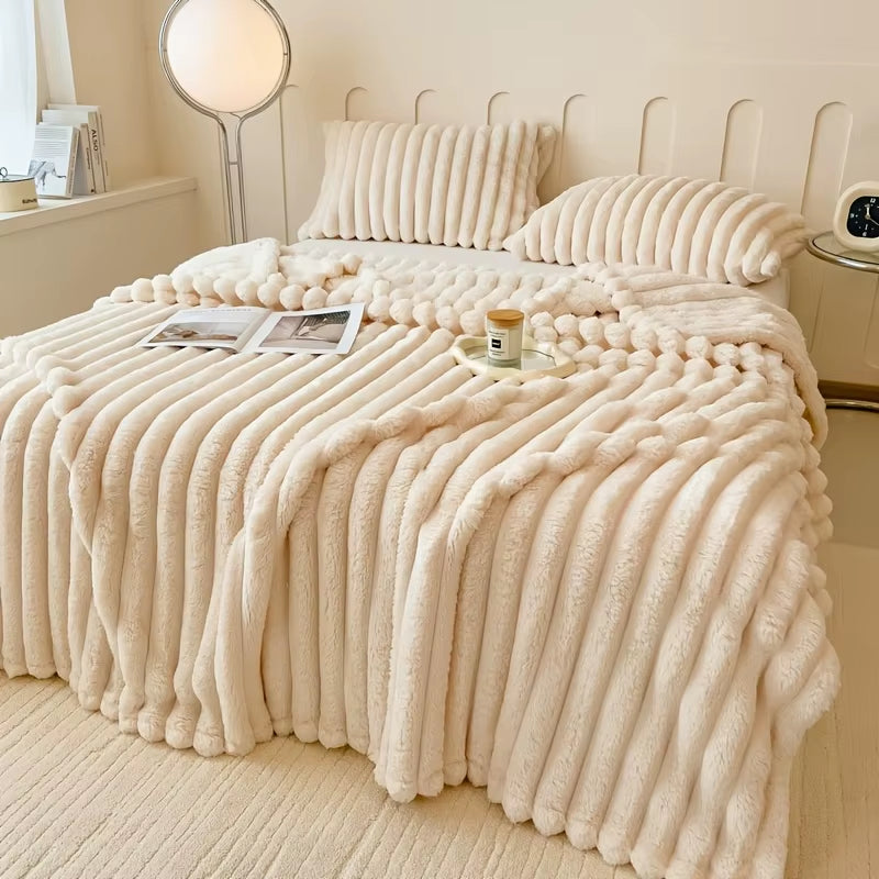 Luxurious white gold velvet plush blanket and pillowcase set—ribbed texture, ultra-soft feel, and elegant bedroom styling with candle tray and ambient lighting